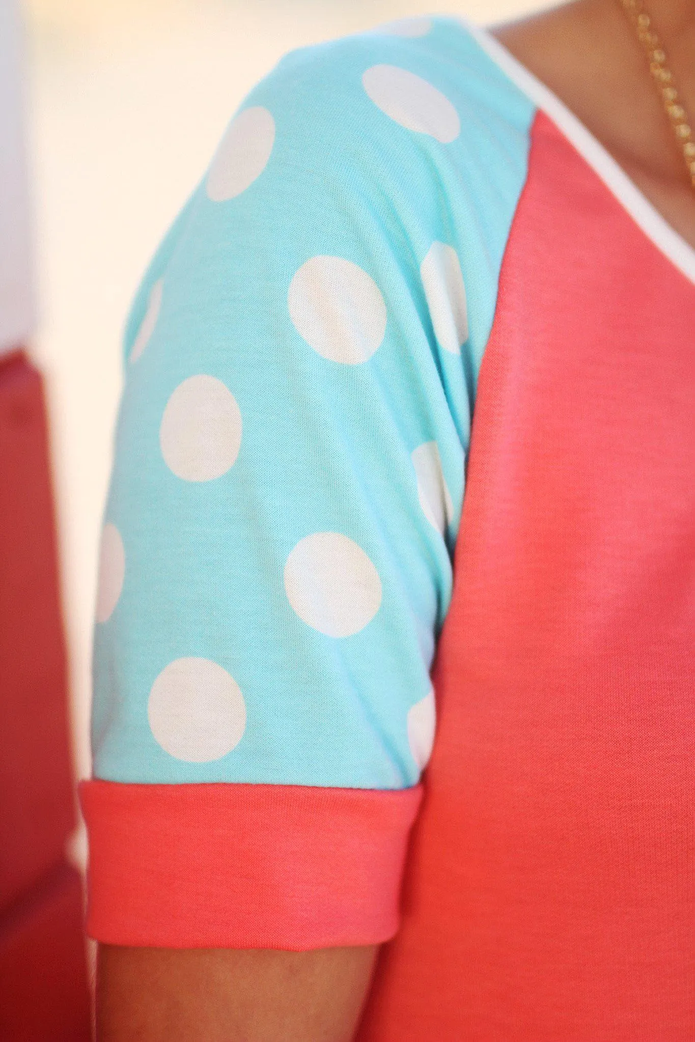 Aqua and Coral Top with Polka Dot Sleeves